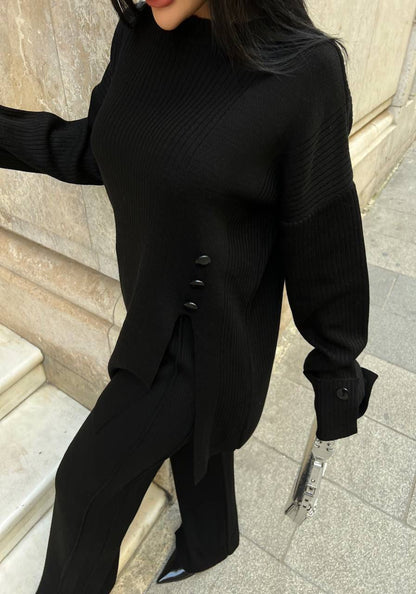 Ensemble noir ample avec ourlet contrastant